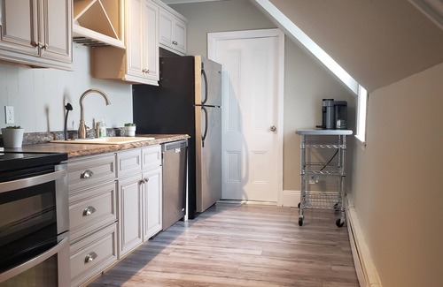 Fredericton Apartment | Rosé All Day King Studio | Retro Vibes | Downtown|