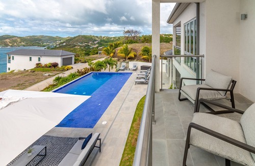 Calvigny Condo | Rose Quartz - 2 Bedroom Luxury Suite with Ocean and Pool Views