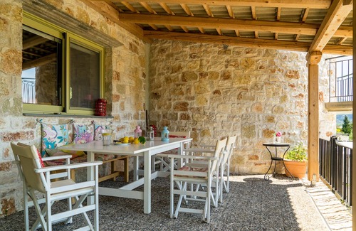 Evgiros Villa | Rose Tower Luxury stone tower villa in the middle of nature with stunning view.