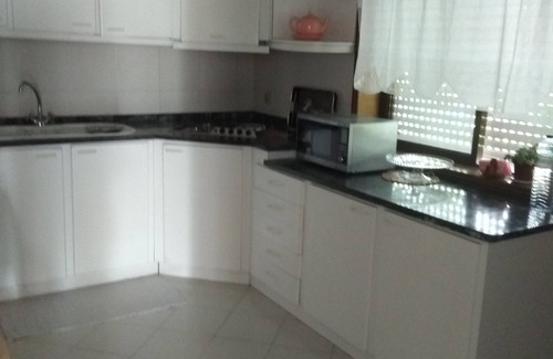 Frazao House | Rota do Romântico, fully equipped house, AC, full kitchen and beautiful balcony