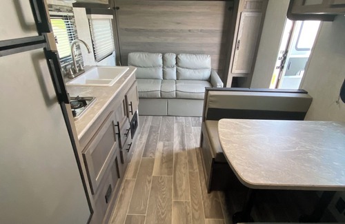 Siler City RV Rental | Rural NC GLAMPING to experience off the grid camping! Privacy & pond plus more!