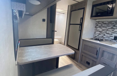 Siler City RV Rental | Rural NC GLAMPING to experience off the grid camping! Privacy & pond plus more!