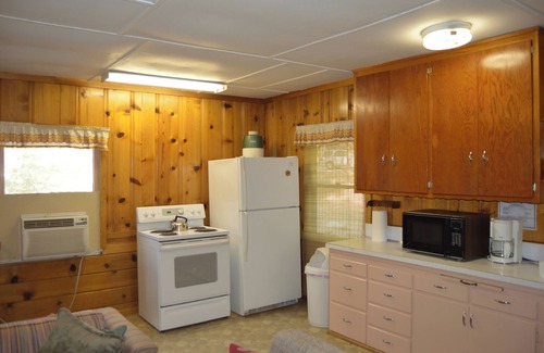 Lake Isabella Cabin | Rustic 1950s Cabins Located on 4 Acres of Pine Trees Surrounded by Upper Desert