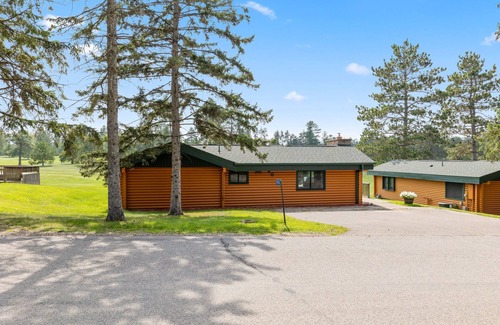 Breezy Point Cabin | Rustic 2BR Cabin with Deck Overlooking Golf Course