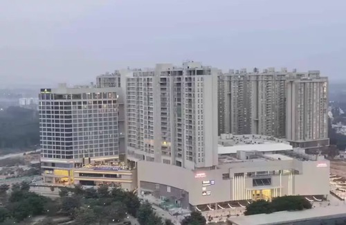 Bengaluru Apartment | Rustic 2BR in Bharatiya City