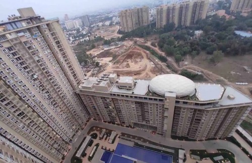 Bengaluru Apartment | Rustic 2BR in Bharatiya City