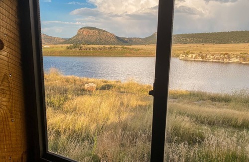 Rainsville Cabin | Rustic 4 bedroom cabin with pond on scenic ranch