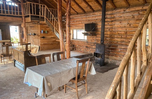 Rainsville Cabin | Rustic 4 bedroom cabin with pond on scenic ranch