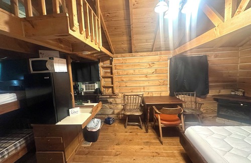 Gnaw Bone Cabin | Rustic cabin in Nashville, Indiana offering a cozy camping experience