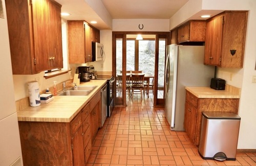 Yosemite West Cabin | Rustic cabin & loft inside Yosemite National Park with deck, views & fireplace