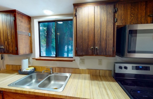 Yosemite West Cabin | Rustic cabin & loft inside Yosemite National Park with deck, views & fireplace