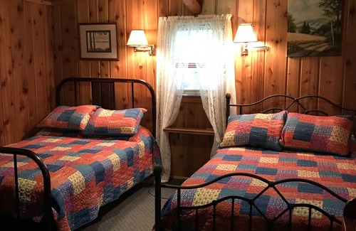 Iron River Cabin | Rustic cabin, two acres of privacy, on quiet McCarry Lake