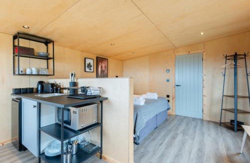 St. Andrews House | Rustic Cabins, sea views from rewilded farm with Highland Cows