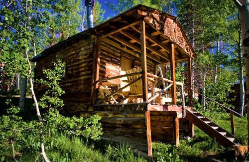Clark House | Rustic Camping Cabin with Lovely Nature Views in Columbine, Colorado