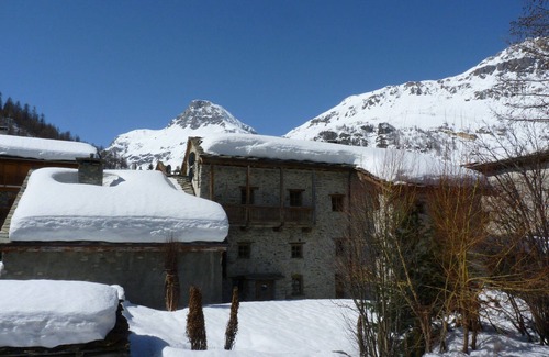 Val-d'Isere Apartment | Rustic Duplex Apartment with Large South-Facing Terrace Near Val-d'Isère Village