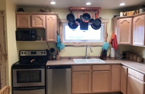 Laramie House | Rustic home close to campus!