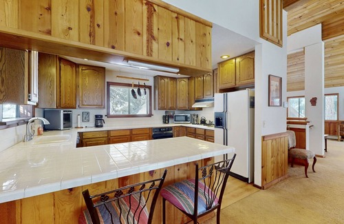 Ridgewood House | Rustic home with wood stove, deck, open floor plan, & nearby activities