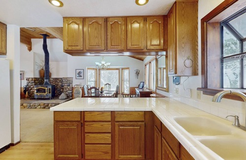 Ridgewood House | Rustic home with wood stove, deck, open floor plan, & nearby activities
