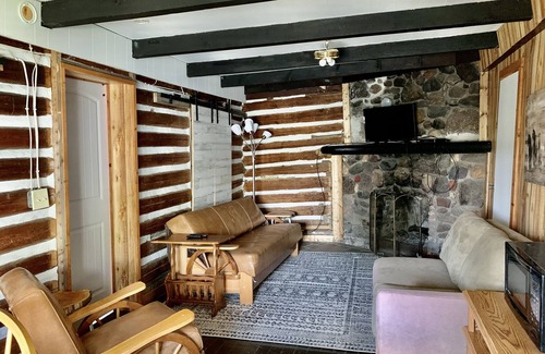 Garrison Resort | Rustic log cabin built in the 1900's! On Private Lake with Great Fishing.