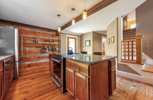 Blacksburg House | Rustic log cabin with modern comforts, scenic views, and cozy spaces for the perfect getaway.
