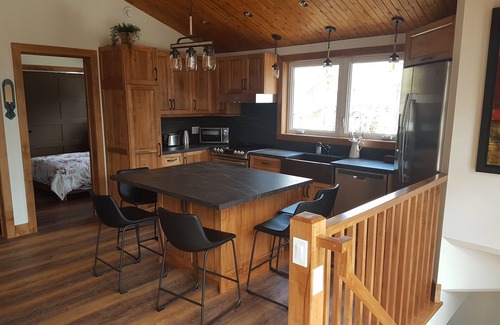 Barrie Ski Chalet | Rustic luxury chalet with pool, a two-minute walk to beach, park and playground!