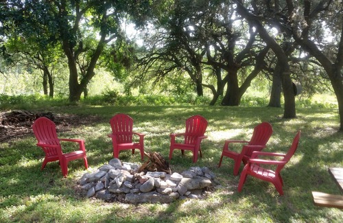 Uvalde Cabin | Rustic River Cabin under the Oaks and just a short walk to the river.