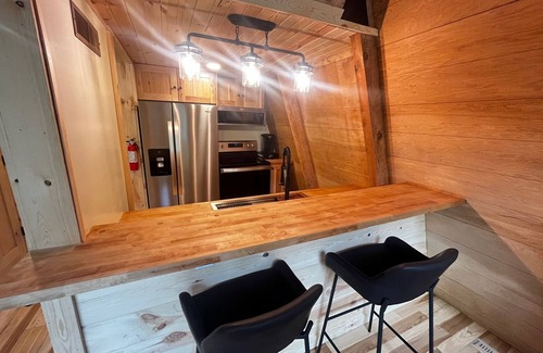 Caledonia Cabin | Rustic Riverside A-Frame Retreat: Secluded Charm.