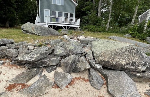 Standish Cottage | Rustic shorefront cottage with a small sandy beach