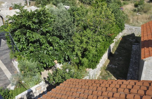 Lustica Villa | Rustic stone house with roof terrace and courtyard f. 4-6 people
