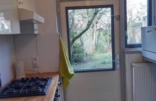 Municipality of Zutphen House | rustige hoekwoning met bad, piano en tuin