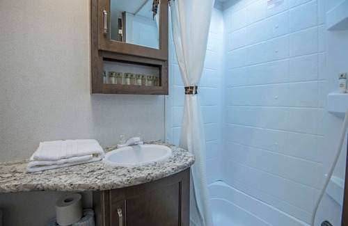 Madras House | RV Rental D21- Keystone Passport 32ft