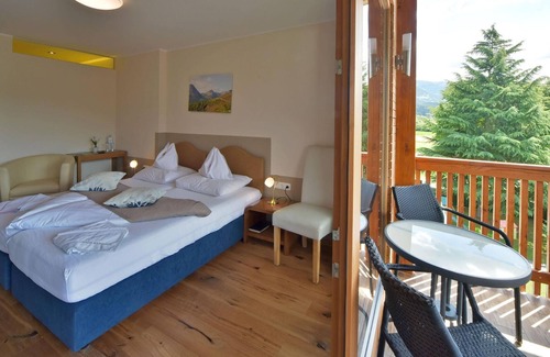 Seeboden Cottage | Süd - See Komfortzimmer Mirnock mit Balkon - Gästehaus Bärwald