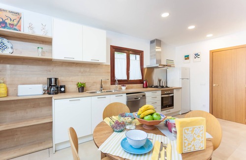 Cala Agulla House | Sa Torre Villa with pool very close to the beach and the town center.