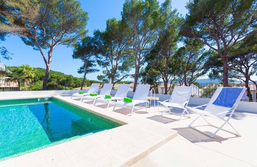 Cala Agulla House | Sa Torre Villa with pool very close to the beach and the town center.