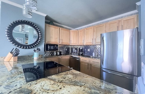 Villa Sabine Condo | Sabine 4D, Waterfront, Sleeps 6-Corner Unit -Sunset Views from every room!