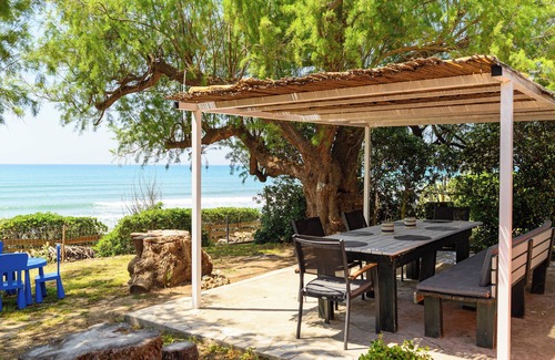 Katakolo House | Salty Noses and Sandy Toes: Beach house paradise. Family friendly!