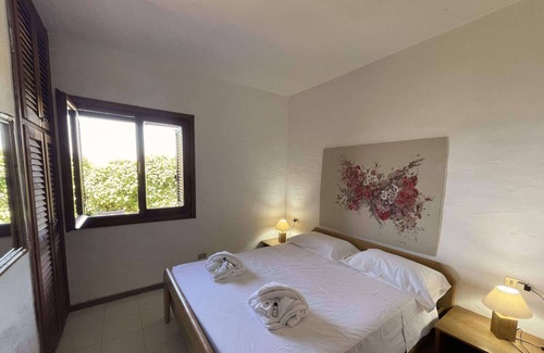 Capo Coda Cavallo Apartment | SAN TEODORO PUNTA EST 2 CAMERE GIARDINO VISTA MARE