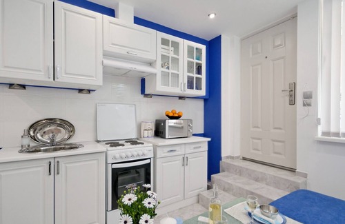 Mousio Apartment | Santorini style in Athens Plaza Luxury apartments
