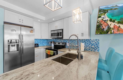 Cabes Point Apartment | Sapphire Dreams: Premier Beachfront Elegance in Building A of The Sapphire Beach Resort