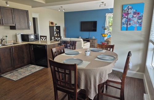 McMillan Apartment | Scenic 2 bedroom walkout suite with hot-tub and outdoor pool, across from Park.