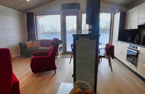 Kilpisjarvi Cottage | Scenic Arctic Retreat with Saana fell views & riverfront in Kilpisjärvi