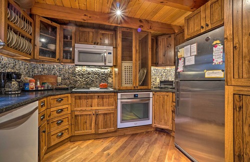 Titusville Cabin | Scenic Log Cabin with Fire Pit & Stocked Creek!