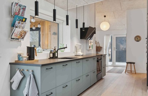 Odder House | Scenic summer house with space for the family
