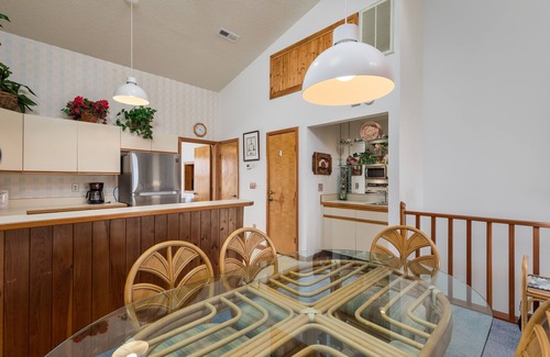 Kitty Hawk Condo | Sea Dunes condo with community pool and tennis, beach access, porch swing, baby gate, and WiFi