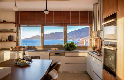 Koutsouras Condo | Sea-front luxury penthouse with panoramic views with hot tub