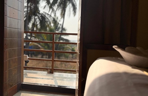 Hosdurg Resort | Sea island resort near Pulimut beach with AC and balcony.