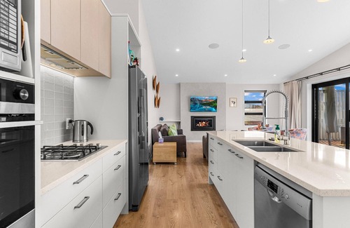 Langs Beach House | Sea Spray - Large modern, sunny holiday home with expansive decks and stunning views over Bream Bay