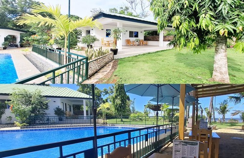 San Juan House | Sea View Deluxe Bungalow with WiFi and AC Within The Casa Feliz Ocean Resort
