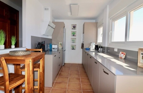 Cabo Roche House | Sea view holiday home with garden and private pool on the sandy beach in Roche
