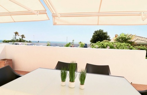 Cabo Roche House | Sea view holiday home with garden and private pool on the sandy beach in Roche